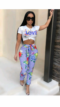 Load image into Gallery viewer, GRAPHIC PRINT SHORT SLEEVE TOP WITH FLORAL PRINT STRIPED PANTS
