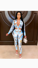 Load image into Gallery viewer, GRAPHIC PRINTING KNOTTED HEMLINE TOP AND PANTS SET
