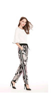 Load image into Gallery viewer, WOMEN'S FASHION MULTICOLOR FLOWER PRINTED CASUAL PANTS
