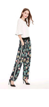 Load image into Gallery viewer, WOMEN'S FASHION MULTICOLOR FLOWER PRINTED CASUAL PANTS
