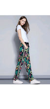 Load image into Gallery viewer, WOMEN'S FASHION MULTICOLOR FLOWER PRINTED CASUAL PANTS
